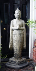 Tall stone Standing Buddha garden statue with hands in greeting