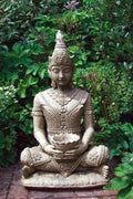 Stone Serene Buddha garden statue seated holding a lotus bowl