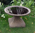 Stone Low Birdbath on a flared square pedestal